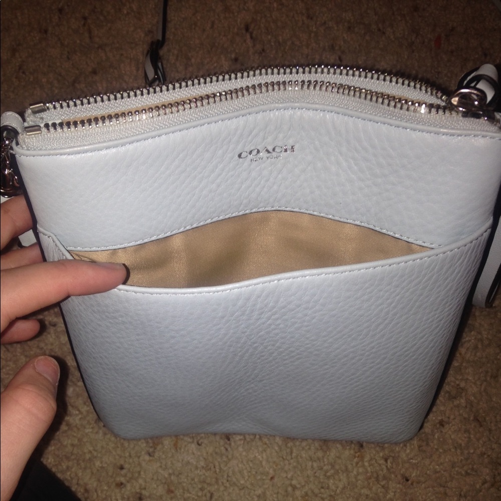 Light blue Coach crossbody bag